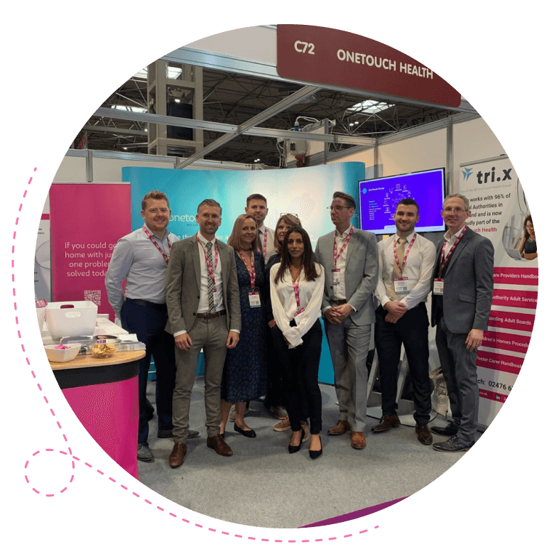 OneTouch team or partners photographed at a care sector exhibition or trade show